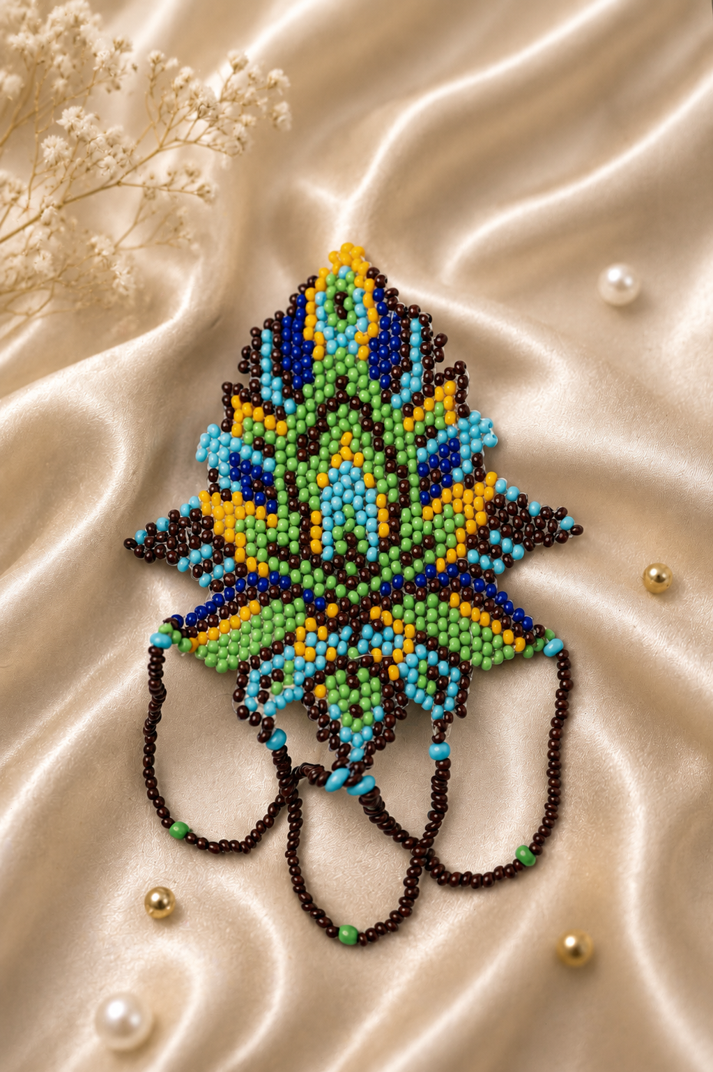Manikusum (The beaded blossom)