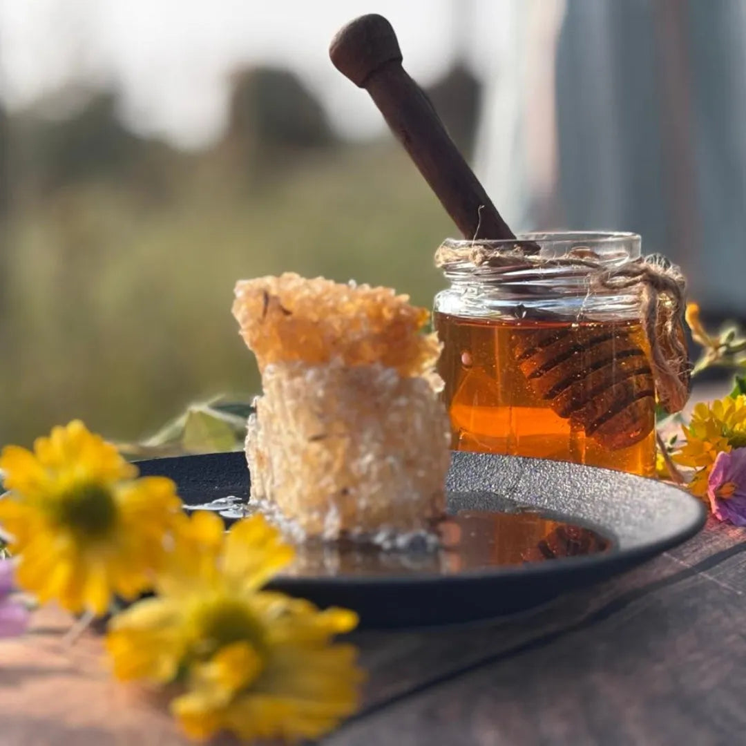 Shabari Naturals Multiflora Honey jar with honeycomb and wooden dipper